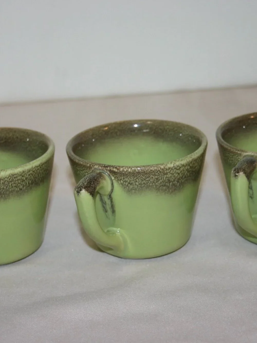 A Set of 3 MCM Bauer Mission Moderne Coffee Cups Chartreuse & Brown B-313